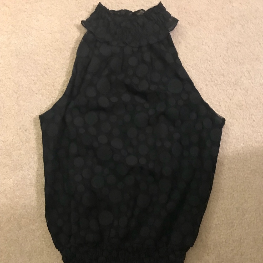 Black sleeveless high neck shirt